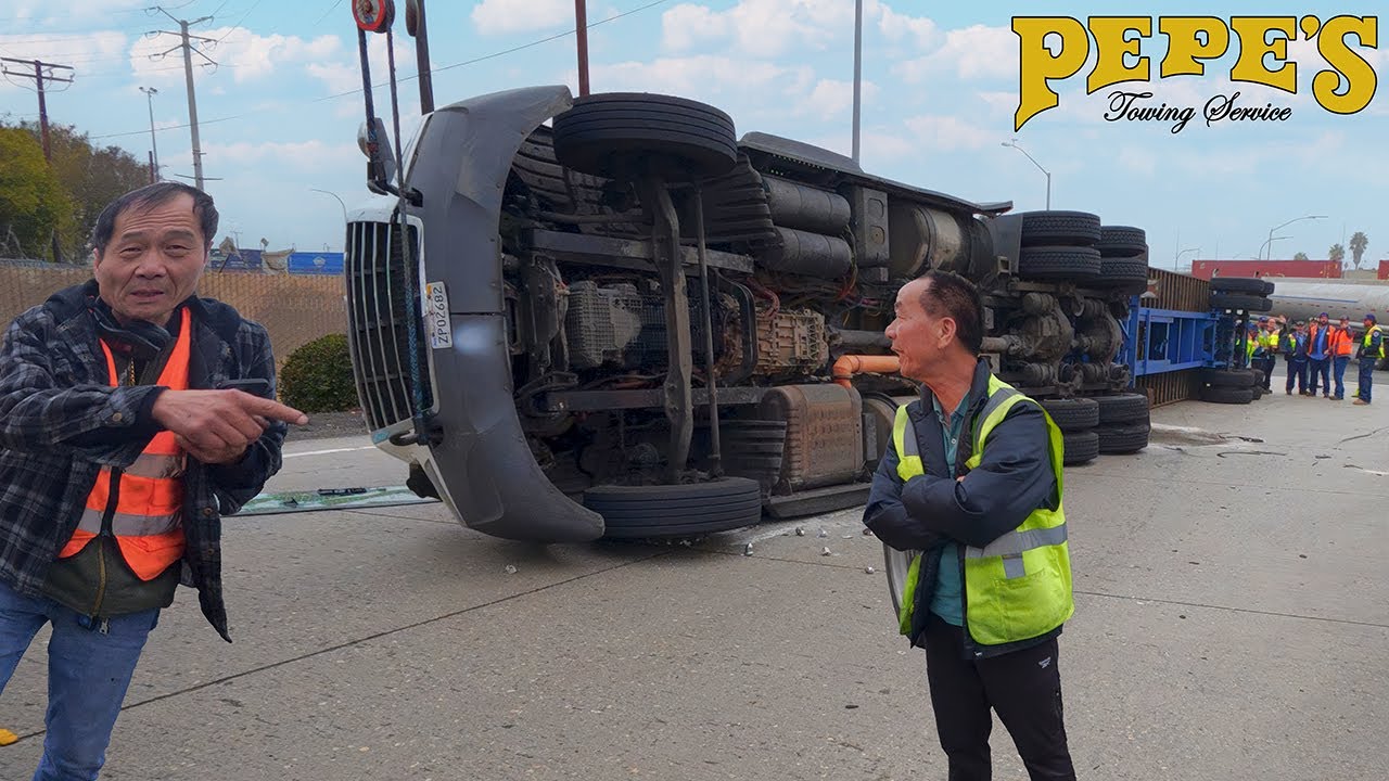 This guy rolled over a container, tries to drive away WITHOUT PAYING