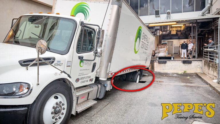 Box Truck Falls in Sinkhole While Unloading! Box Truck Falls in Sinkhole While Unloading!
